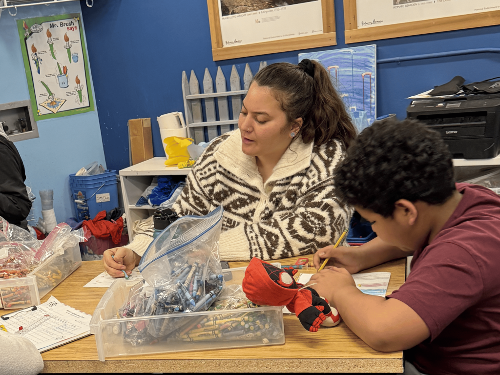 Support therapist in class with student